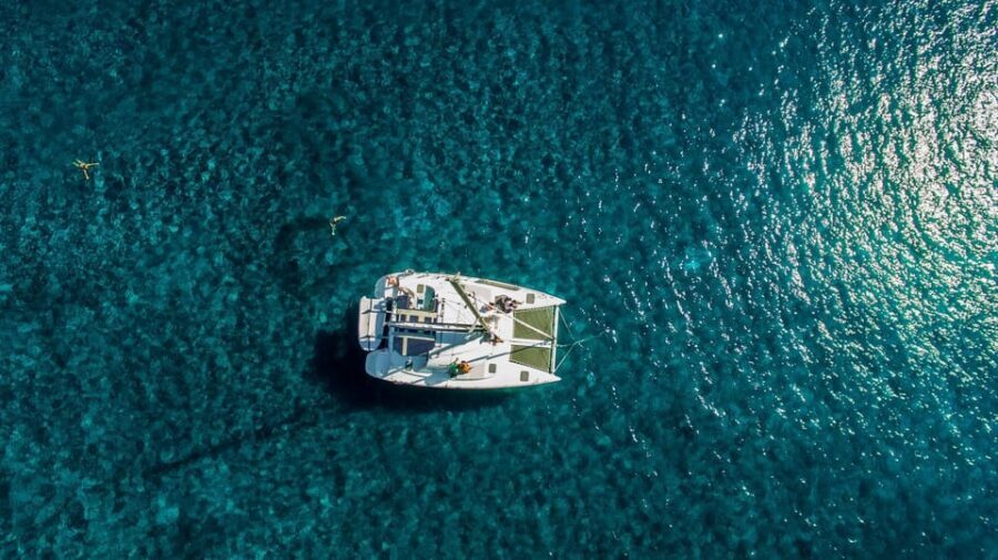 Santorini: Private Catamaran Cruise with Food & Drinks - Getting on board at Vlychada: how the day actually moves