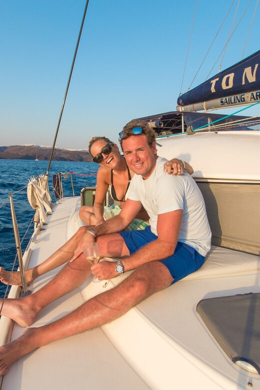 Santorini: Private Catamaran Cruise with Food & Drinks - The islands from the water: Aspronisi and the viewpoint stops