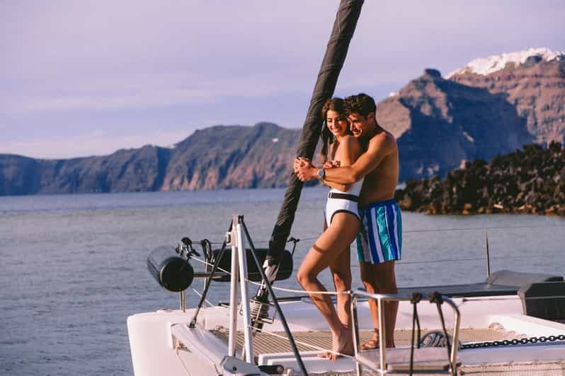 Santorini: Private Catamaran Tour with BBQ Meal and Drinks - Boat comfort and what you’ll notice once aboard