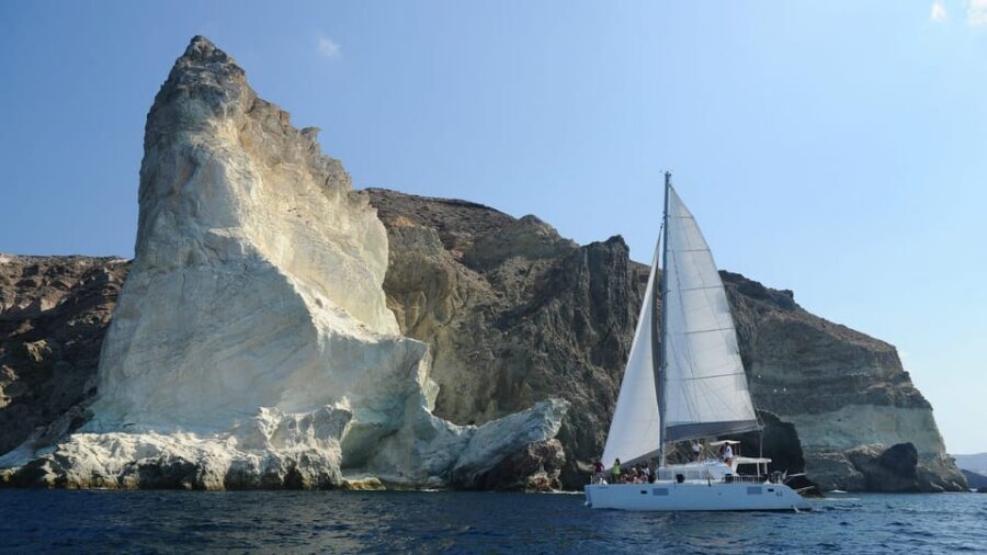 Santorini: Private Catamaran Tour with BBQ Meal and Drinks - Akrotíri pass-by: a calm scenic moment