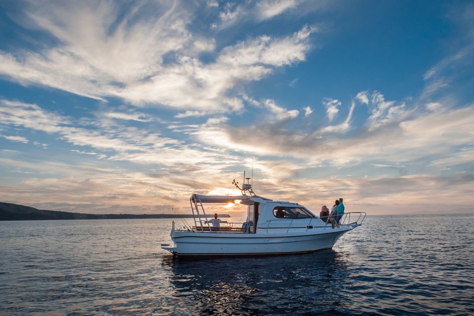 Santorini Private Cruise boat fishing tour - BBQ, Snorkeling - Quiet beaches, clear water, and snorkeling stops