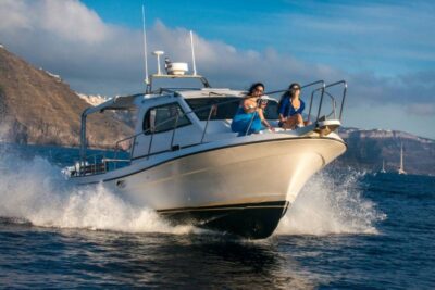 Santorini Private Cruise boat fishing tour - BBQ, Snorkeling - Casting lines across the Aegean