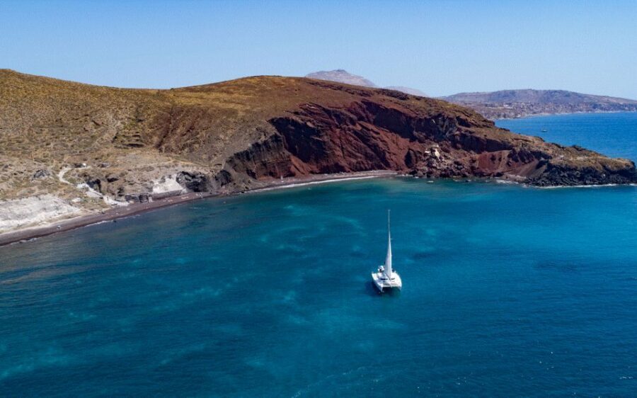 Santorini: Private Day Cruise with a BBQ meal and Open Bar - Hot springs on the volcanic islands: why this swim is different
