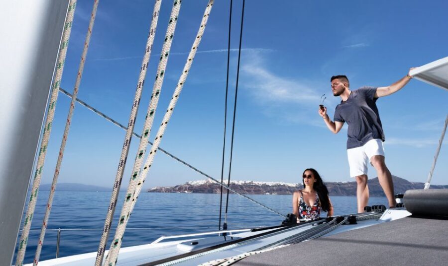 Santorini: Private Day Cruise with a BBQ meal and Open Bar - The Caldera classics from the sea: Red, White, Black Mountain, and a lighthouse