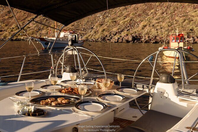 Santorini Private Daytime Sailing Cruise with Meal, Drinks &Transfer included - Between Two Volcanoes: Lighthouse, Hot Springs, and the Caldera View Eastwards