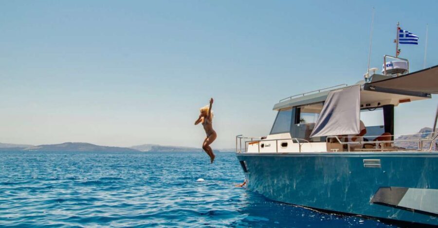 Santorini: Private Diamond 36 Motor Yacht Caldera Cruise - Manolas, Indian Rock, and the Venetian Lighthouse camera stops