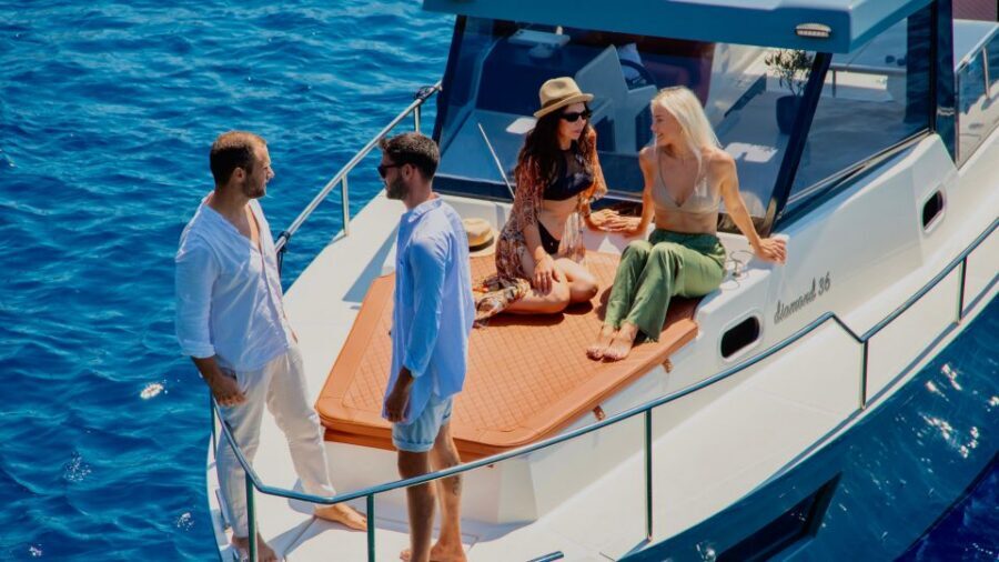 Santorini: Private Diamond 36 Motor Yacht Caldera Cruise - Oia timing: sunset view without the cliff-stress