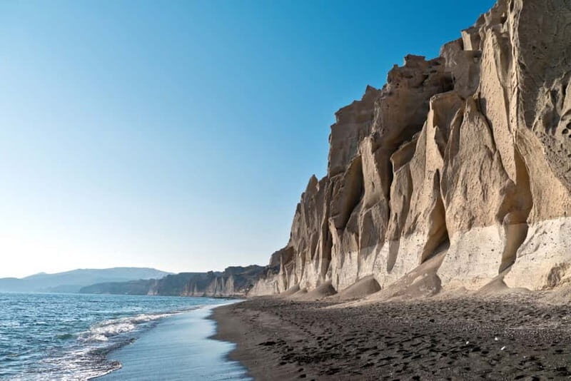 Santorini: Private Guided Sightseeing Day Tour - Perissa Black Sand Beach: where the volcano shows up in your shoes