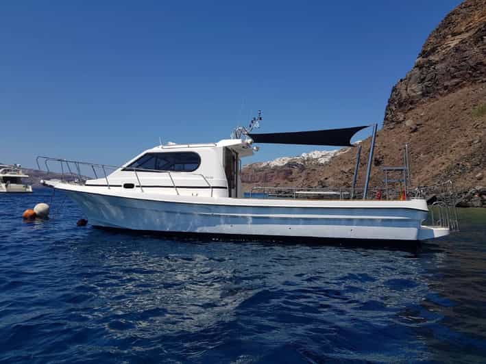 Santorini: Private Motorboat Cruise and Volcano Hike - Cruising across the Caldera