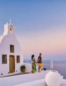 Santorini: Private Oia Village Photoshoot - Meeting outside Osteria Pizza Pasta in Oia