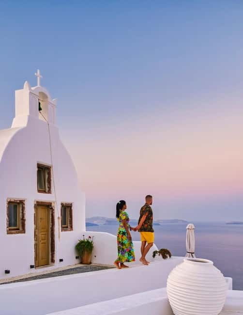 Santorini: Private Oia Village Photoshoot - Meeting outside Osteria Pizza Pasta in Oia