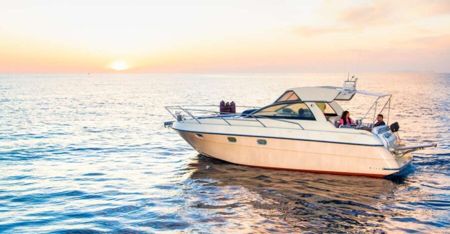 Santorini: Private Sunset Cruise with Barbecue and Drinks - Volcanic Beaches: Red Beach Sands and White Beach Cliffs