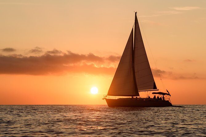 Santorini Private Sunset Sailing Tour with Dinner, Drinks &Transfer included - Passing between the volcanoes: warm water and the caldera experience