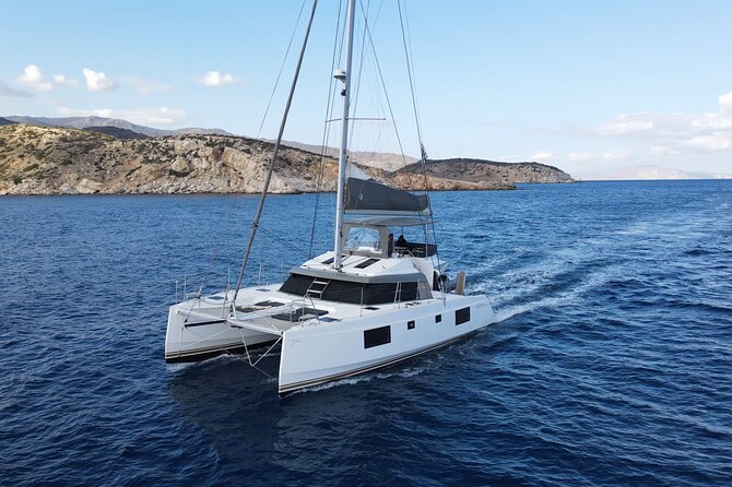 Santorini Private Tour Half-Day Sailing Platinum Catamaran Cruise - Leaving from Vlichada and getting aboard