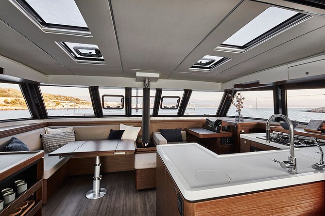 Santorini Private Tour Half-Day Sailing Platinum Catamaran Cruise - The Oia view and the sunset question