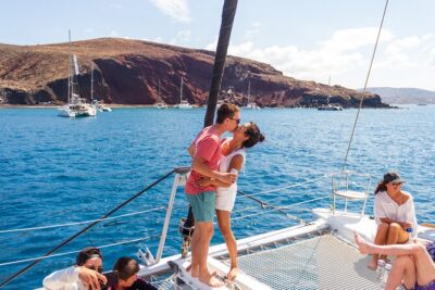 Santorini Sailing Catamaran Daily Cruises w/ Greek BBQ @Thirasia - Red Beach: 20 minutes beside volcanic cliffs