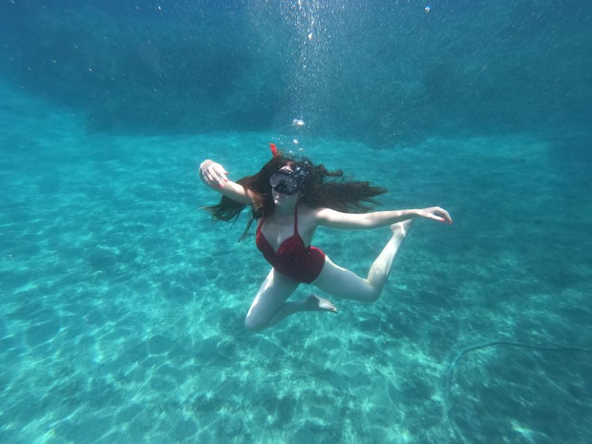 Santorini: Sea Caves Kayak Trip with Snorkeling and Picnic - Akrotiri coves: where the coastline feels close and personal