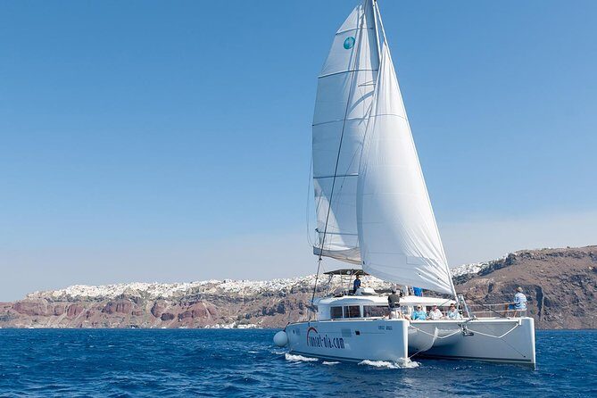 Santorini Small-Group Catamaran Sailing Trip(BBQ,drinks, transfer) - Red Beach and White Beach: Two Volcanic Swims, Plus the Onboard BBQ