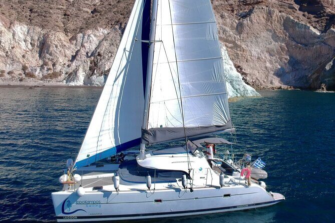 Santorini: Standard Small-Group Catamaran Cruise with Food/Drinks - How to choose between the daytime and sunset sailing