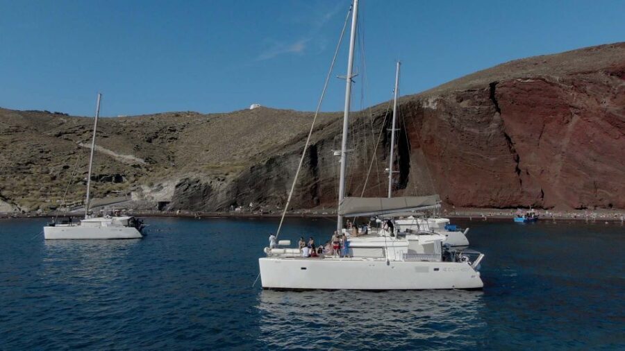Santorini: Sunset Cruise with Greek Dinner and Transfer - A Modern Catamaran Ride Along the Caldera