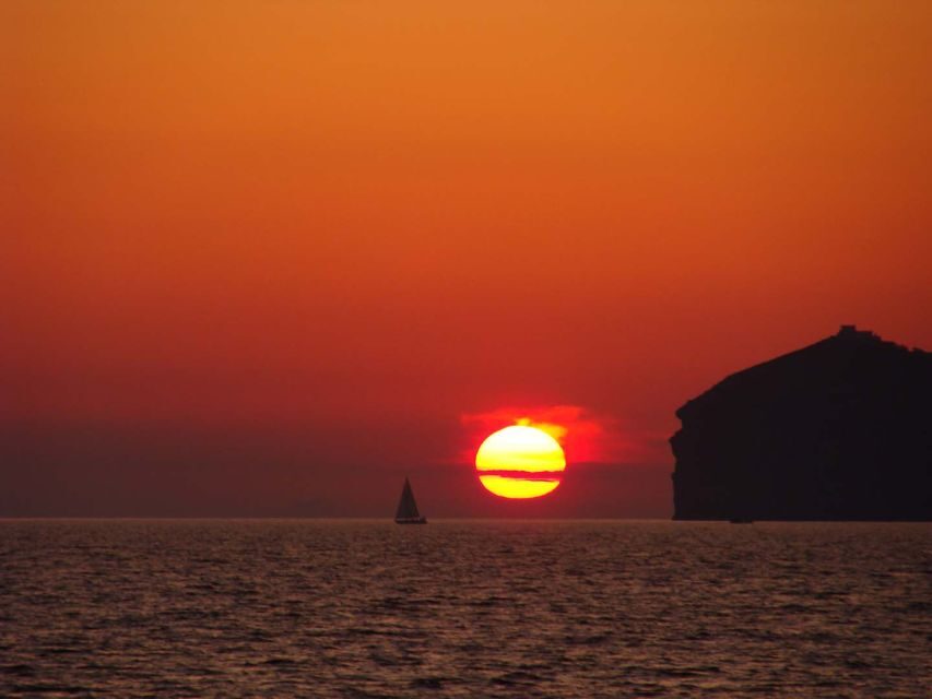 Santorini: Sunset Cruise with Greek Dinner and Transfer - Nea Kameni and Palea Kameni: The Warm Springs of the Volcano