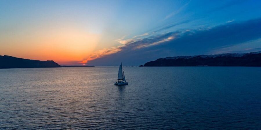 Santorini: Sunset Cruise with Swim Stops, Dinner, and Drinks - Volcanic Hot Springs Dip: The Relaxing Payoff