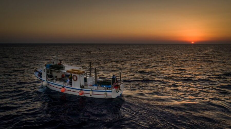 Santorini Sunset Fishing Trip with Dinner and Drinks - From Vlychada Harbor to a True Santorini Sunset