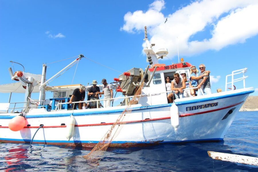 Santorini Sunset Fishing Trip with Dinner and Drinks - Cruising the Caldera: Red, White, and Black Beaches by Sea