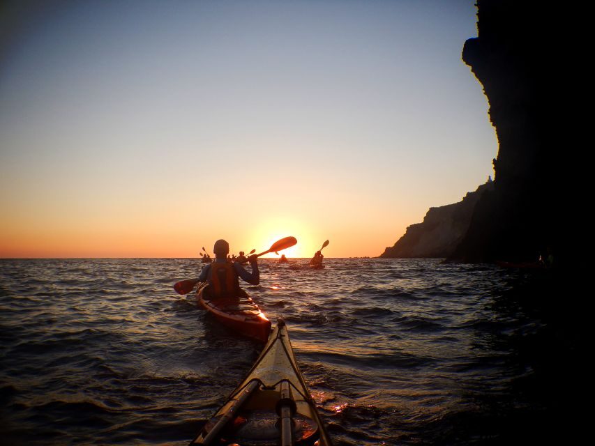 Santorini: Sunset Sea Kayak with Light Dinner - Dry Clothes, Greek Dinner, and the Best Kind of Finish