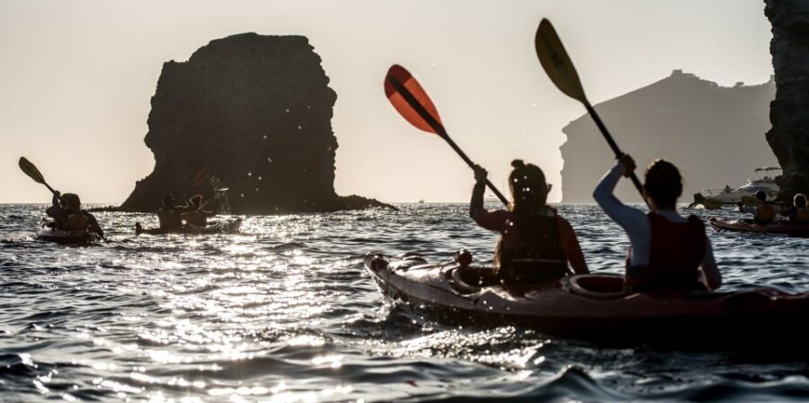 Santorini: Sunset Sea Kayak with Light Dinner - Paddling East Past White Beach and Red Beach Volcanic Color