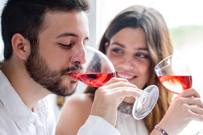 Santorini Sunset Walking Tour inc. tastings and 5 drinks - Firostefani: caldera views with a sweet and liqueur