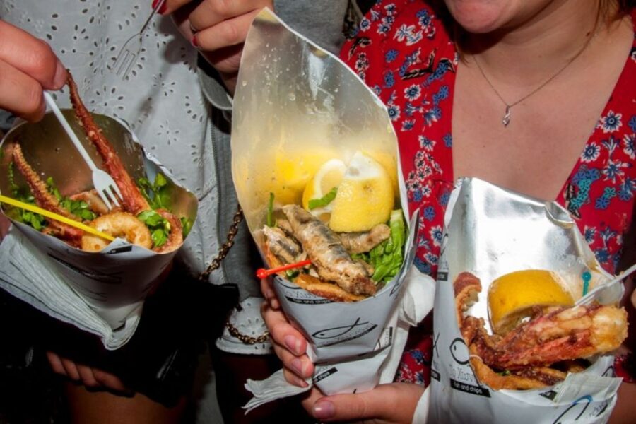 Santorini: Sunset Walking Tour with Local Food and Drinks - The core comfort food: ancient seafood and souvlaki breaks