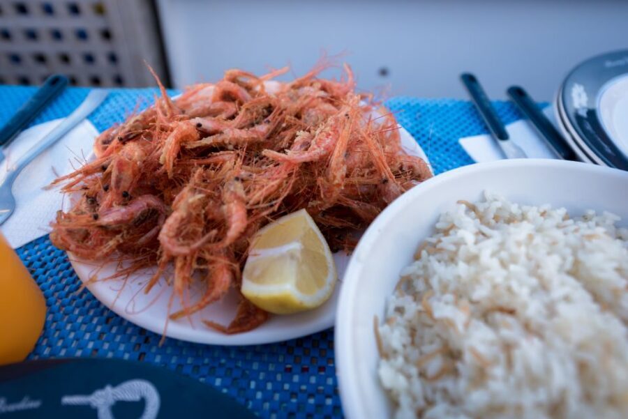 Santorini: Traditional Fishing Trip and Fresh Fish Lunch - From Your Hotel to the Wooden Boat: How the Morning Flows