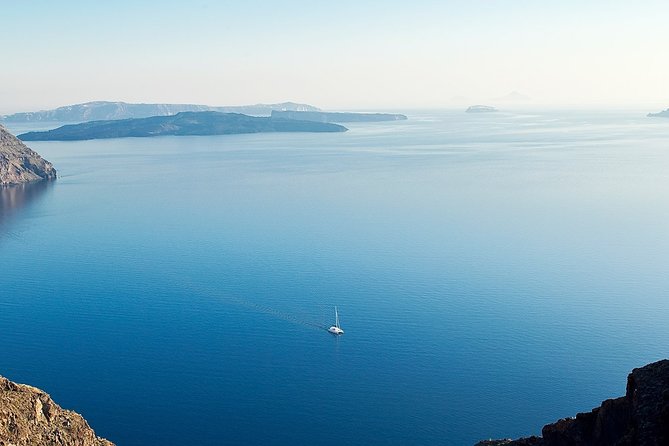 Santorini Volcanic Sunset Cruise - Setting sail from Athinios Port