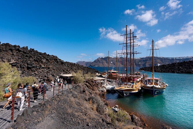 Santorini - Volcano and Hot springs Boat Trip with Bus Transfer - Morning logistics: where the boat leaves and when to line up