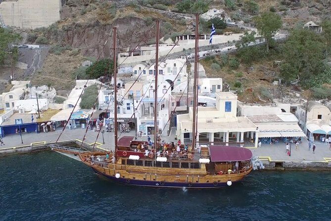 Santorini Volcano Sunset Cruise with Dinner - Sunset Near Oia: The Golden-Light Finish