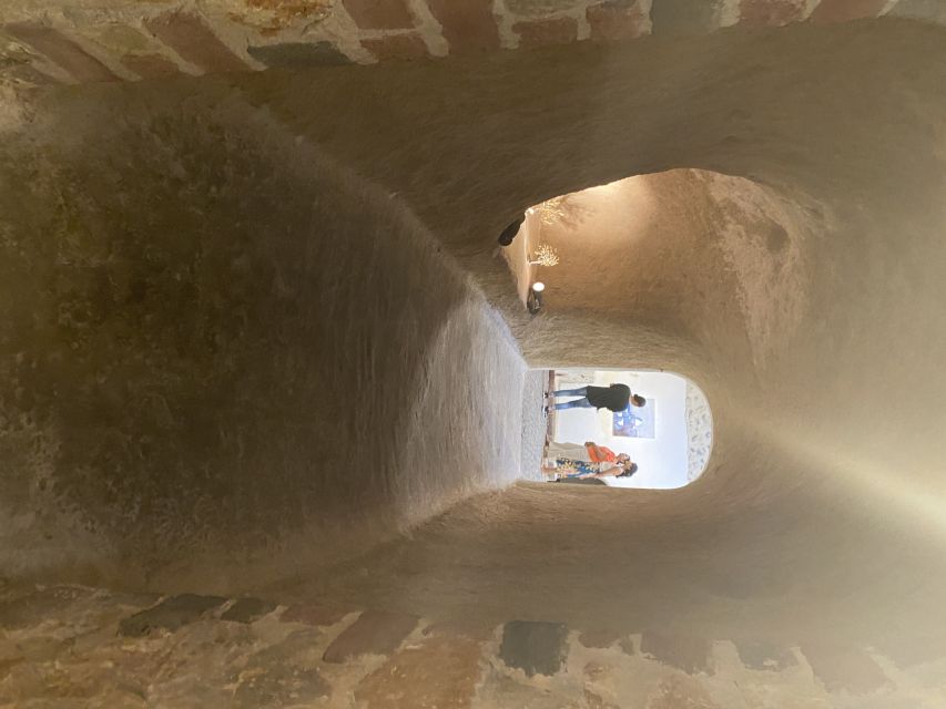 Santorini: Wine Tasting and Cave Settlement Tour - First stop: a traditional village with local context