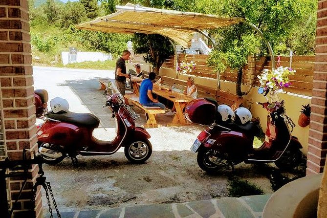Savour The Flavors Of Corfu Vespa Scooter Tour - Sweet samples at Lazaris Distillery