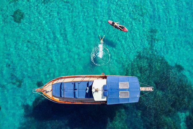 SemiPrivate Trip on 50ft Traditional Wooden Boat with Greek Lunch - Price and value: what $163.27 buys you in real time