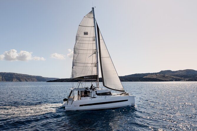 Shared Catamaran Half Day Cruise in Santorini - Red Beach: red cliffs, red sand, and quick photo time