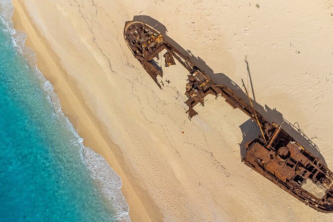 Shipwreck & Blue Caves Private Cruise - Navagio Beach, the famous stop with a practical catch
