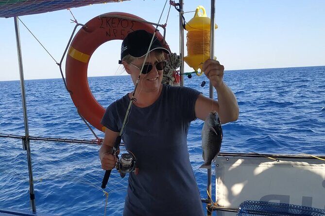 Skevos Fishing Trip Rhodes - The crew dynamic: Skevos, Captain Mike, and hands-on teaching