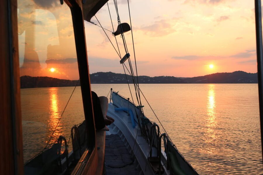 Skiathos: Boat Cruise with Dinner & Sunset Viewing - Lalaria Beach swim and snorkel: how the timing feels