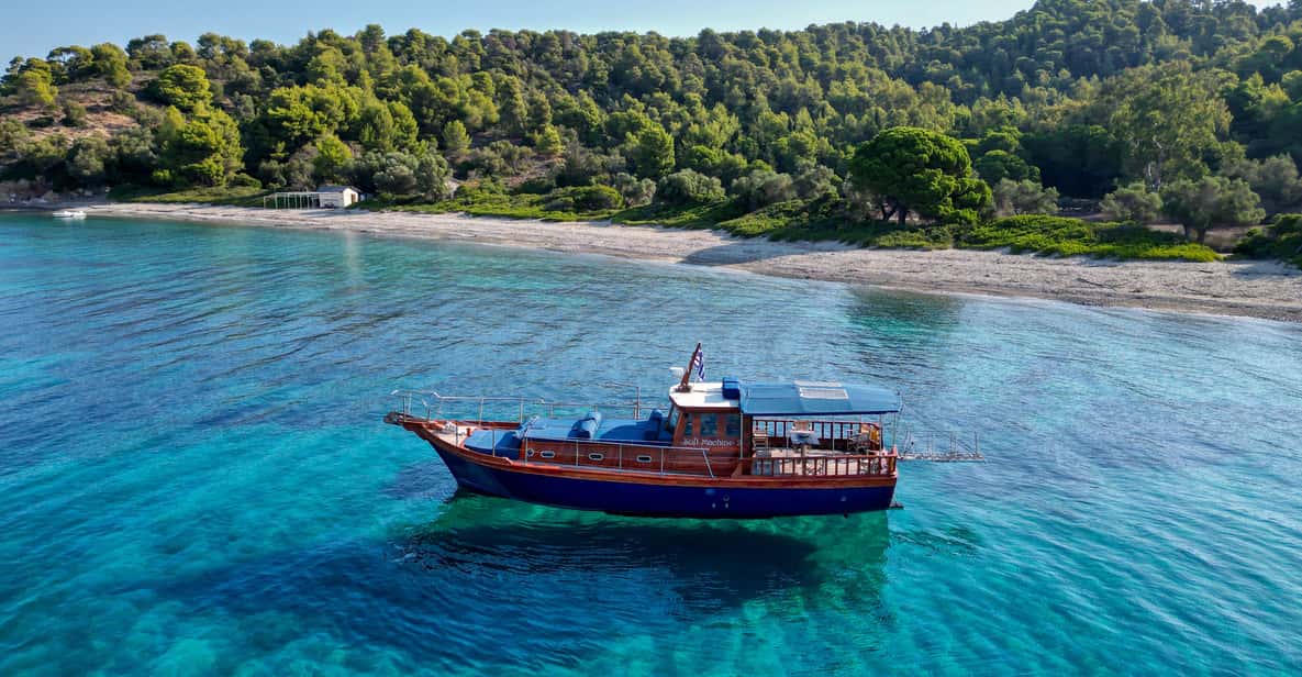 Skiathos: Traditional Boat Cruise with Swim Stops & Lunch - Snorkeling and paddle boarding between meals