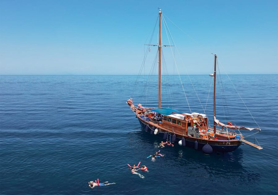 Skiathos: Wooden Sailboat Full- or Half-Day Trip with Meal - Entering Skiathos’ old port on a real wooden sailboat