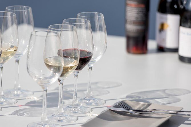 Small-Group Greek Food and Wine Tasting Tour in Santorini - Two family wineries and Santorini’s volcanic-wine story