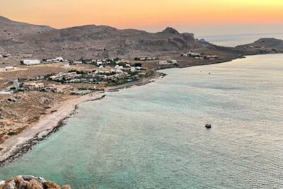Small group hiking from Pefkos to Navarone Bay at sunrise - Climbing the road to Navarone Bay