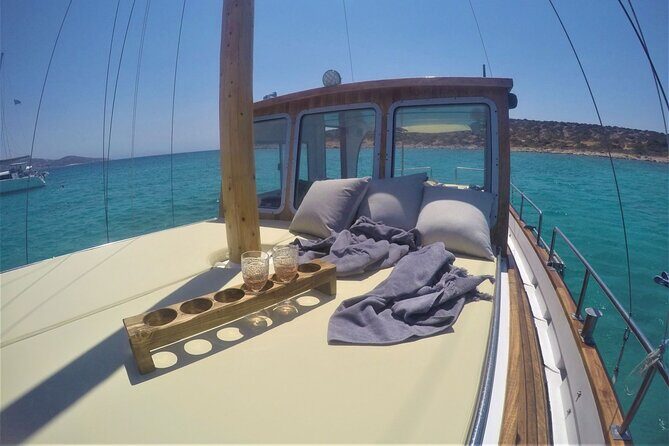 Small Group Kaiki Cruise & Greek Gastronomy Experience - Antiparos coastlines: rock drama plus a shorter swim window