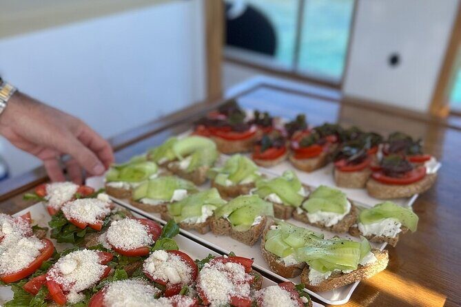 Small Group Kaiki Cruise & Greek Gastronomy Experience - Tsimintiri Island lunch on board: Greek gastronomy done right
