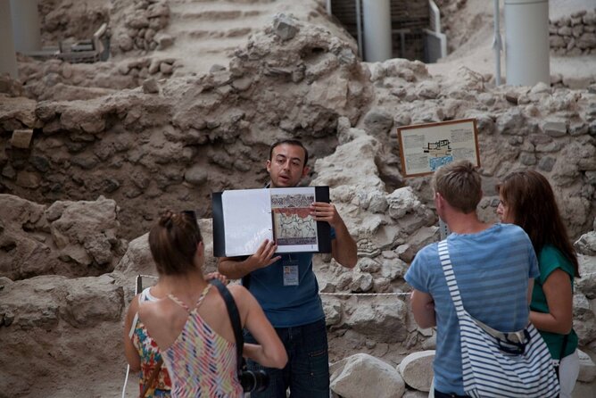 Small Group Santorini Discovery Tour with Lunch and Wine Tasting - Perissa Black Sand Beach and a chance to slow down